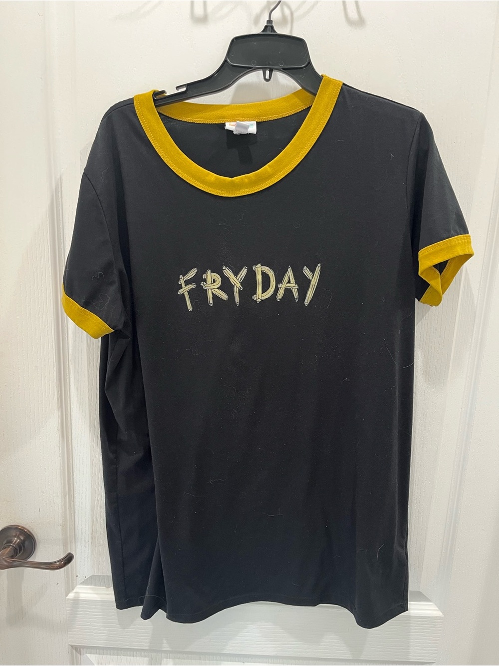 LuLaRoe Black Ringer Tee with Yellow Trim and 'FRYDAY' Graphic